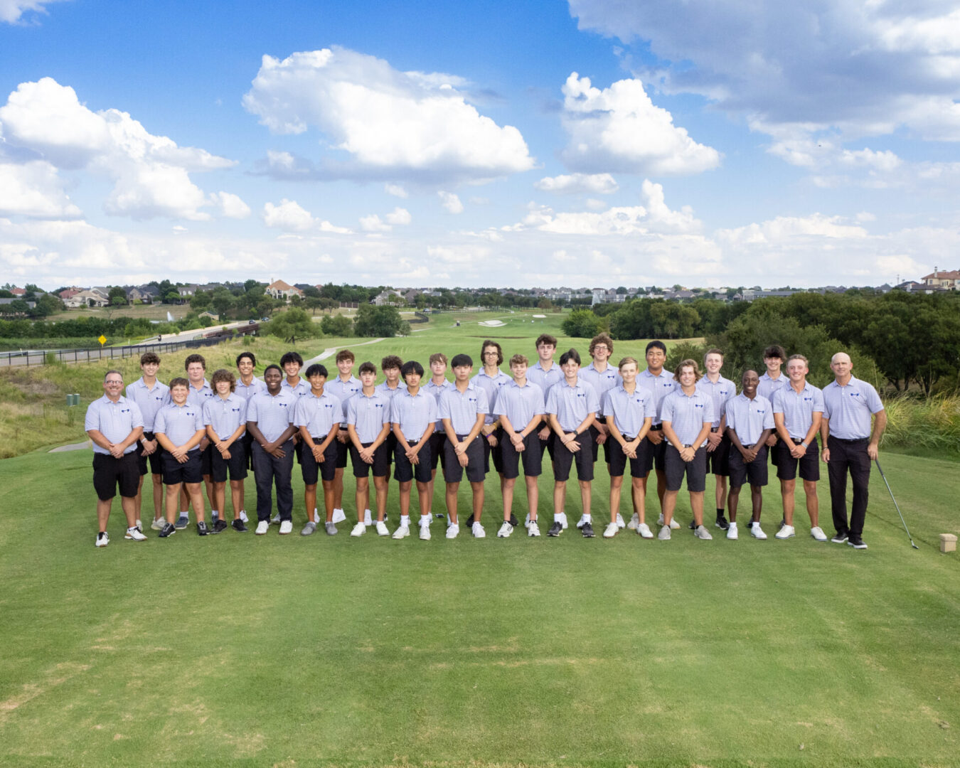 golf team of boys standing together for a picture