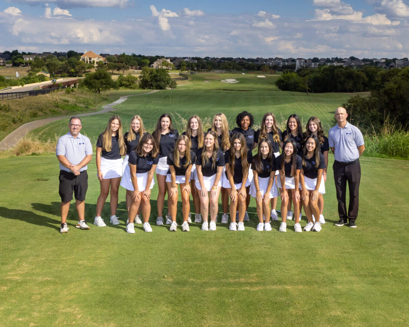 golf team for girls standing together for a picture