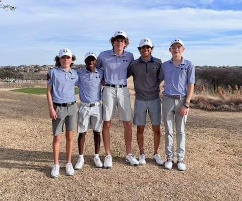 A Group of Boys in Golf Uniform Photograph
